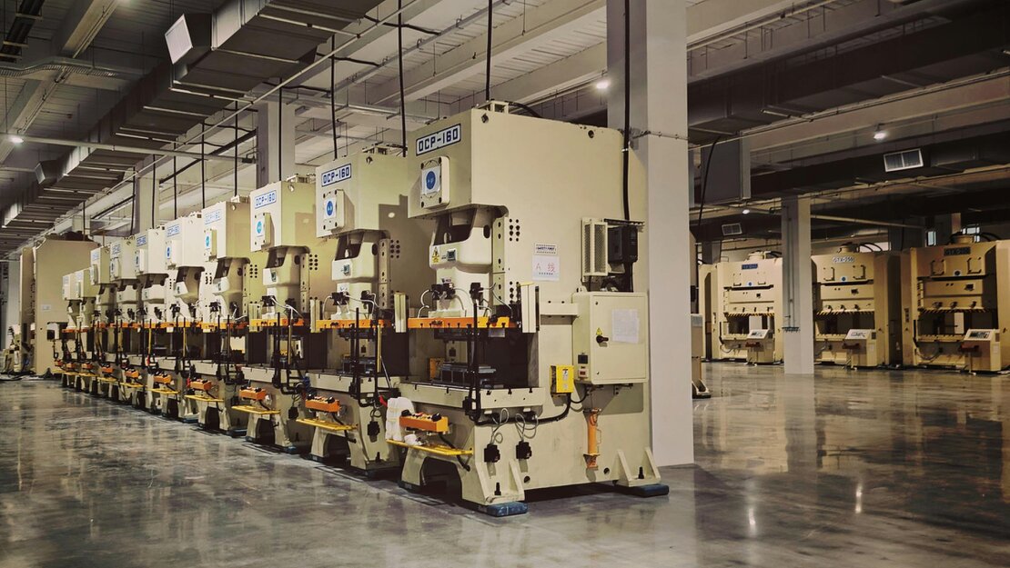 OEM engineer working on a connected industrial machine